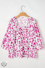 White and pink leopard print blouse on hanger, available in UK sizes and Euro sizes