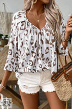 White and brown leopard print blouse in euro sizes and UK sizes with v-neckline and sleeves