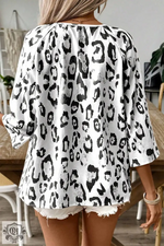 White and black leopard print blouse with loose-fitting sleeves in UK sizes