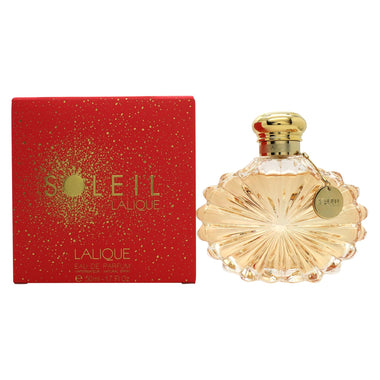 Ornate glass perfume bottle with sunburst design next to Lalique Soleil Eau 50ml Spray box