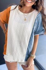 Color block knit sweater featuring orange, white, and blue panels for relaxed style