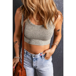 Gray sleeveless crop top with light-wash denim jeans, perfect for relaxed styling