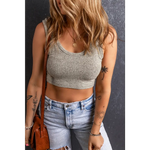 Gray sleeveless crop top with distressed denim shorts, perfect for relaxed summer styles