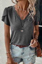 Charcoal gray v-neck t-shirt with distressed denim shorts and layered necklaces, sizes bust hem