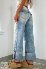 Wide-leg cuffed denim jeans in medium wash from Myosotis for a relaxed fit