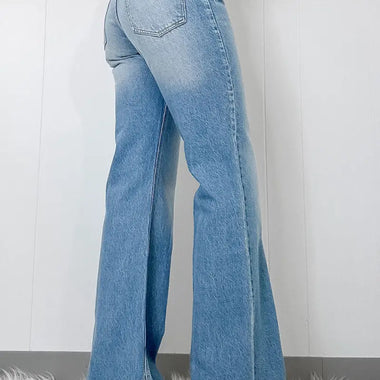 Light-wash denim high rise split-hem flare jeans from Myosotis for a relaxed style