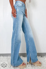 Light blue high rise Myosotis jeans with wide legs and front slits for relaxed style