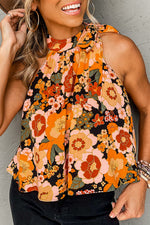 Sleeveless floral blouse with retro orange and peach print, perfect for relaxed style and sizing