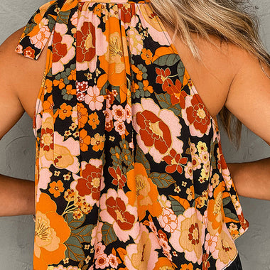 Floral halter top in orange, brown and green retro print with relaxed bust hem width