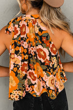 Floral halter top in orange, brown and green retro print with relaxed bust hem width