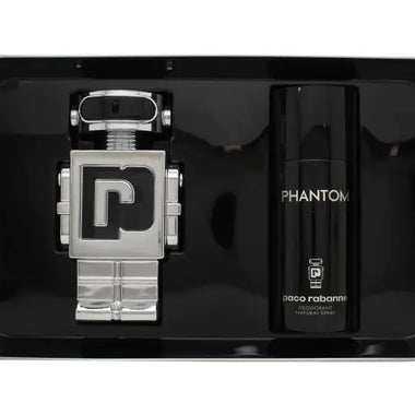 Silver robotic toy beside Paco Rabanne Phantom Presentset 100ml EDT and deodorant