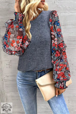 Gray sweater with floral print balloon sleeves and round neckline in various sizes