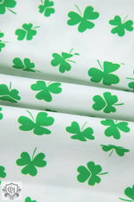 Green shamrock pattern on white fabric for Pink Bowknot Printed Pajama Set in euro sizes