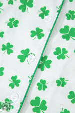 White fabric with green shamrock pattern in Pink Bowknot Printed Pajama Set for relaxing