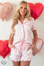 Pink Bowknot Printed Short Sleeve and Ruffled Shorts Pajama Set for relaxing in style