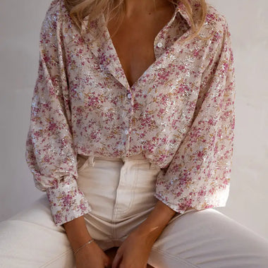 Floral print button-up blouse with long sleeves and white pants in Euro sizes