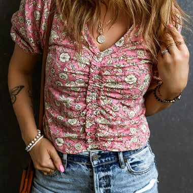 Pink floral short puff sleeve blouse with ruched detailing, perfect for relaxed styling