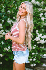 Person in a red striped tank top and distressed denim shorts showcasing the Pink Stripe Contrast Round Neck Sleeveless Slim Top