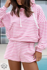 Pink and white striped loungewear set featuring hoodie and shorts for relaxed comfort