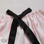 Pink and white striped shorts with a black bow for a stylish pink striped pajama set