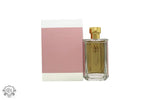 Glass perfume bottle with golden liquid and pink box for Prada La Femme Toilette 100ml Spray