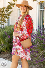 Boho-style Rose Mixed Floral Plus Size Dress with tan hat and purse for relaxed look