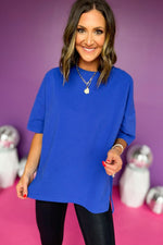 Bright royal blue relaxed fit short-sleeved sweater showcasing casual style and comfort