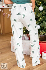 White pajama pants with green Christmas tree print for relaxing in the Skobeloff Lounge Set