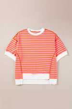 Orange and pink striped short-sleeve sweatshirt with white trim for relaxed stylish comfort