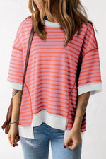 Pink and gray striped oversized t-shirt with layered hem detailing for relaxed styles