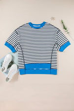 Striped black and white t-shirt with blue trim, perfect for relaxed style in various sizes