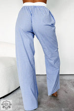 Blue and white striped cotton wide leg lounge pants with an elastic waistband for relaxation