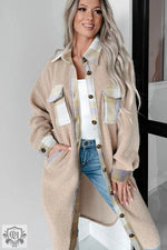 Long beige sherpa-style jacket featuring plaid patchwork design for relaxed styling