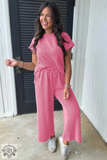 Pink pleated two-piece outfit featuring a Smoke Gray Solid Corded Knit design