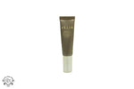 Olive-colored Stila Aqua Glow Serum Concealer tube with metallic silver cap