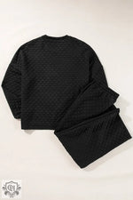 Black quilted pajama set for relaxation, available in various UK sizes