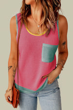 Pink knit tank top with mint green pocket detail, perfect for Relax Relax styles