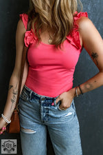 Woman wearing Strawberry Pink Ruffled Wide Straps Slim Tank Top styled with ripped jeans