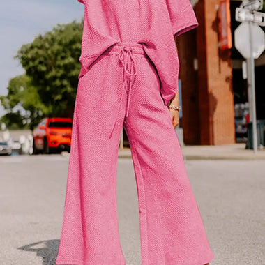 Pink textured loose fit T-shirt and drawstring pants set for relaxed comfort