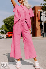 Pink textured loose fit T-shirt and drawstring pants set for relaxed comfort