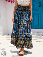 Bohemian paisley print summer maxi patterned skirt displayed elegantly