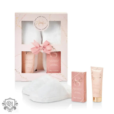 Pink and white spa gift set featuring The Kind Edit Co. Signature Slippers Gift Set