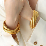 18K gold fashionable three-layer interlocking thread design simple style bracelet - QH Clothing