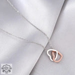 "Love Eternal: Two-Tone Interlocking Heart Necklace in Gift Light Box" -  QH Clothing