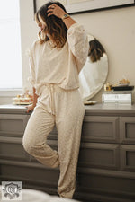 Cozy cream loungewear set featuring drawstring pants and sweatshirt in White Cheetah Print