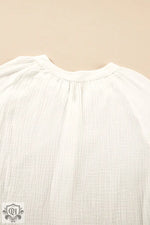 White pleated blouse with round neckline in euro sizes for relaxed fit and style