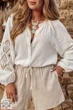 White linen romper with embroidered sleeves and statement necklace in Euro sizes