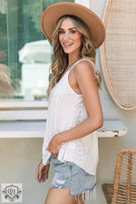 White eyelet strappy scoop-neck tank top with scalloped edges and bust hem width detail