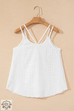 White eyelet strappy scoop-neck tank top on wooden hanger showcasing bust hem width