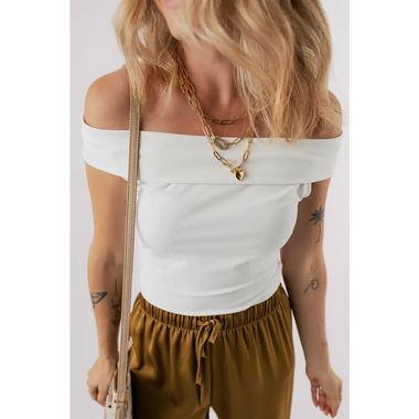 Off-shoulder white crop top with brown drawstring pants, perfect for casual relax wear